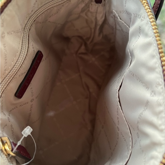 Michael Kors crossbody in an eggplant color - Picture 5 of 5